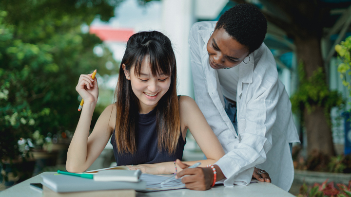 Two people working